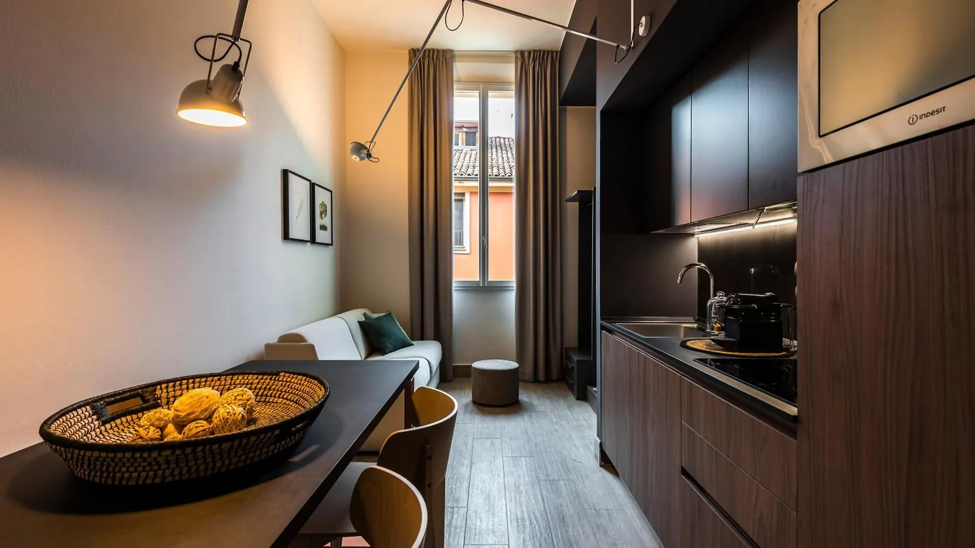 Eco Chic Room With Sofa Bed And Kitchen By Design Club Collection Bologna Apartment